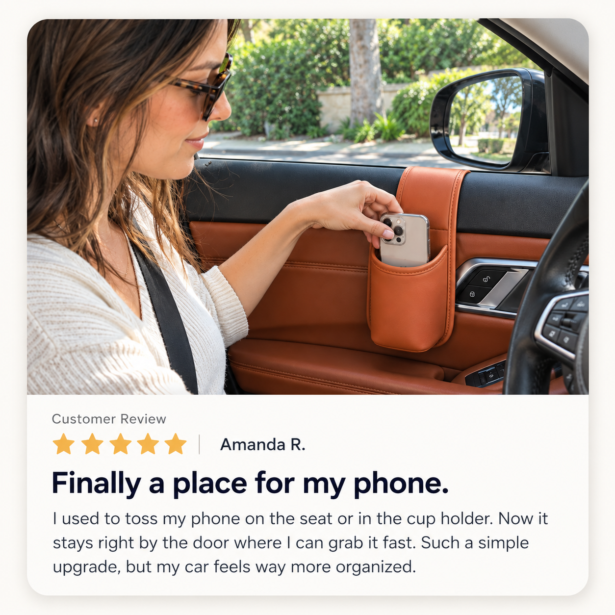 Driver storing phone in car door organizer